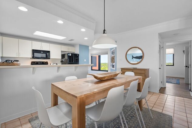 Dining area and open kitchen in Unit 701E
